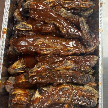 Big Reds BBQ Pit - bbq ribs covered in bbq sauce - Barbeque Near Me - Dearborn, Michigan