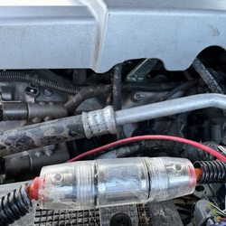 Hendersons Car Audio & Alarm - Wiring in the engine bay that I asked them to remove.