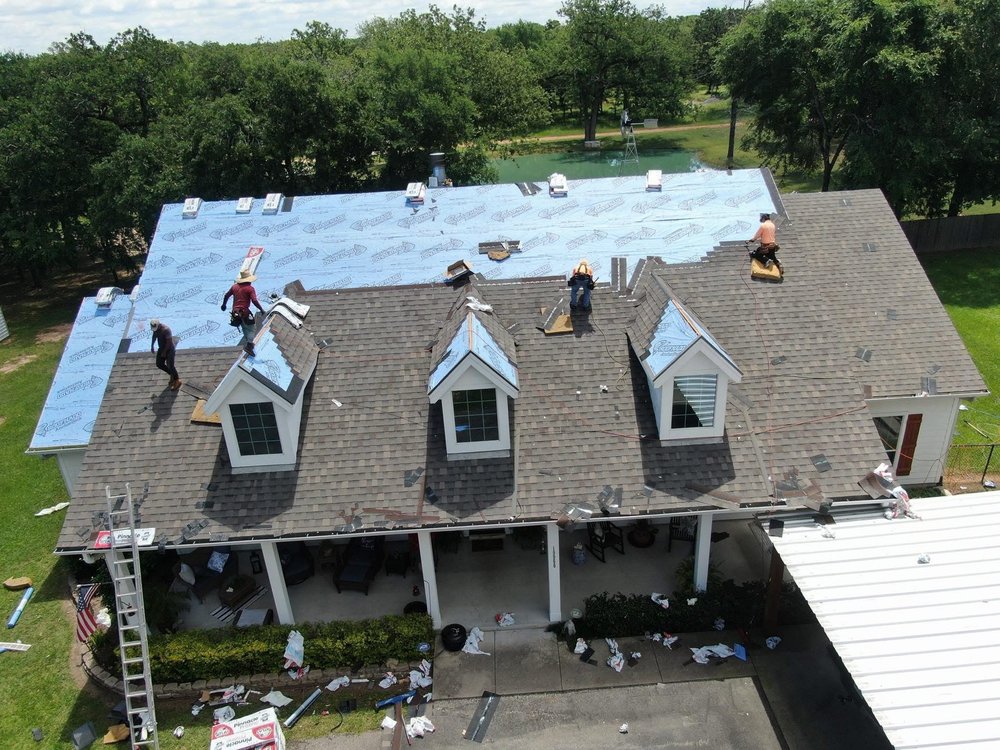 Slide of Top Notch Roofing