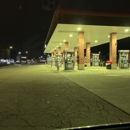 a gas station at night