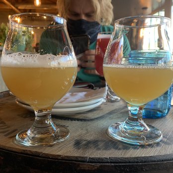 Dark Sky Brewing - 2 5oz IPAs (Count Em Up & Rainy Daze); 1 10oz Sour (Ebenezer Smoojie) in the background - Breweries Near Me - Flagstaff, Arizona