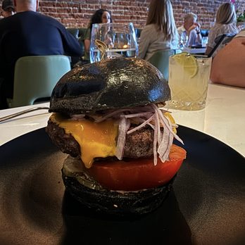 Porterhouse - Burger with charcoal bun - Steakhouses Near Me - El Segundo, California Porterhouse - Burger with charcoal bun - Steakhouses Near Me - El Segundo, California