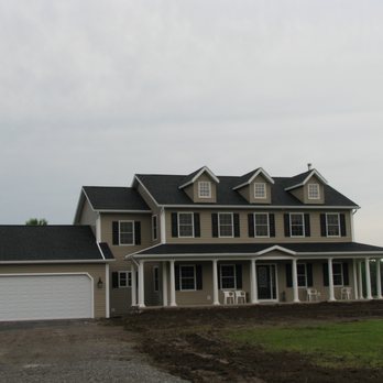 Alvord Builders - a large house with a garage - General Contractors Near Me - Batavia, New York Alvord Builders - a large house with a garage - General Contractors Near Me - Batavia, New York