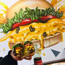 Orange Cow Burgers - They make the burger look identical to the photo on the wall. Nice