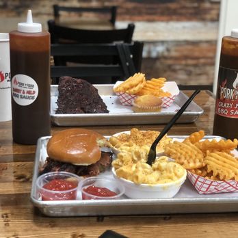 Pork On A Fork - Brisket sandwich (center)- waffle fries, Mac n cheese (2) Ribs- waffle fries, cornbread muffin - Barbeque Near Me - Phoenix, Arizona Pork On A Fork - Brisket sandwich (center)- waffle fries, Mac n cheese (2) Ribs- waffle fries, cornbread muffin - Barbeque Near Me - Phoenix, Arizona