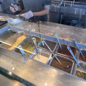 Chipotle Mexican Grill - Sliding our bowls on the dirty counter - Mexican Near Me - South Portland, Maine Chipotle Mexican Grill - Sliding our bowls on the dirty counter - Mexican Near Me - South Portland, Maine