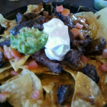 Taco Bueno - a plate of nachos - Mexican Near Me - Little Rock, Arkansas Taco Bueno - a plate of nachos - Mexican Near Me - Little Rock, Arkansas