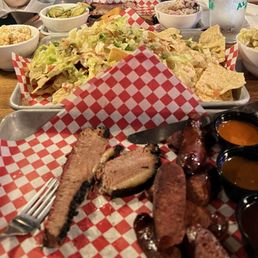 Brisket, Texas hot links, potato salad, street corn salad Brisket, Texas hot links, potato salad, street corn salad