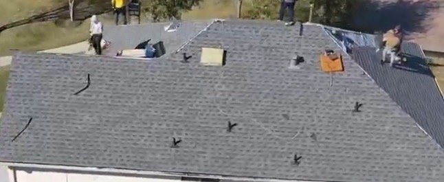 Slide of Stone Castle Roofing