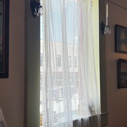 Natural lighting against an antique upstairs dining room Natural lighting against an antique upstairs dining room