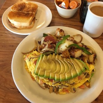 Spire's Restaurants - House Omelette | $10.99 | Mushrooms, tomatoes, onions, bell peppers, Cheddar cheese and avocado. With your choice of toast/potatoes. - American Near Me - Torrance, California Spire's Restaurants - House Omelette | $10.99 | Mushrooms, tomatoes, onions, bell peppers, Cheddar cheese and avocado. With your choice of toast/potatoes. - American Near Me - Torrance, California