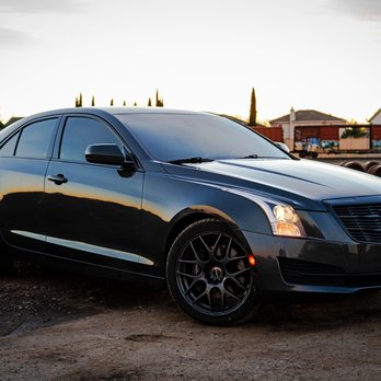 Darkside Window Tinting - Chrome delete on this Cadillac, deleted window trims door handles and front grill also tinted tailights - Car Window Tinting Near Me