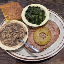 Sun Valley Cafe - Ham steak, Black Eyed Peas, and collards. With the perfect cornbread and some vinegar for the collards.