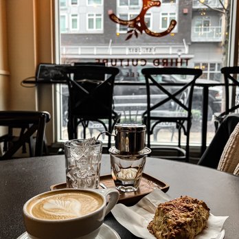 Third Culture Coffee - a cup of coffee and a piece of cake - Coffee & Tea Near Me - Bellevue, Washington Third Culture Coffee - a cup of coffee and a piece of cake - Coffee & Tea Near Me - Bellevue, Washington