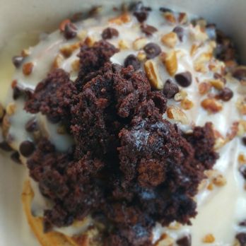 Cinnaholic - Cinnamon roll topped with caramel icing, chocolate chips, pecans, and brownie bits - Bakeries Near Me - Pearland, Texas Cinnaholic - Cinnamon roll topped with caramel icing, chocolate chips, pecans, and brownie bits - Bakeries Near Me - Pearland, Texas