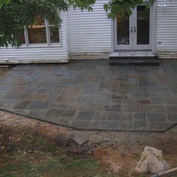 Quality Home Improvements - a patio being installed - Painters Near Me Quality Home Improvements - a patio being installed - Painters Near Me