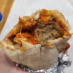New York City Sub Shop - Midtown Bend - Cross section of the meatball sub.  You can see the pickled peppers and a great view of meatball interior