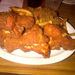 4 pieces of pressure cooked fried chicken (white meat) with fries topped with chili