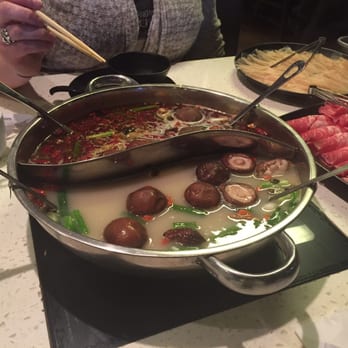 Happy Lamb Hot Pot - The ying-yang bowl allows for my friends to enjoy spicy food while I stick with a tamer side. - Chinese Near Me - Flushing, New York Happy Lamb Hot Pot - The ying-yang bowl allows for my friends to enjoy spicy food while I stick with a tamer side. - Chinese Near Me - Flushing, New York