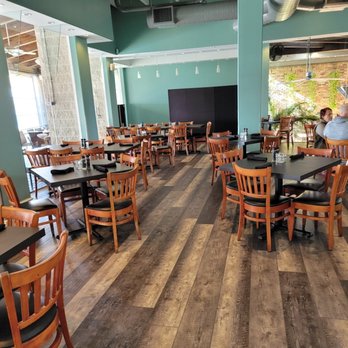 In A Snap Flooring Services Floor Removal - a restaurant with tables and chairs - Flooring Near Me In A Snap Flooring Services Floor Removal - a restaurant with tables and chairs - Flooring Near Me