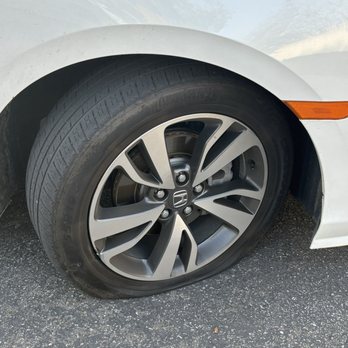 Stone Tire - The front passenger tire that hit a pothole. - Tires Near Me - Escondido, California Stone Tire - The front passenger tire that hit a pothole. - Tires Near Me - Escondido, California