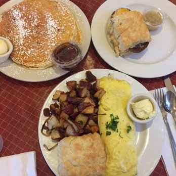 Sweet Maple Cafe - Front: Maple-Opolis, Back Left: Blueberry Pancakes Back Right: Sausage and Cheese Sandwich - American Near Me - Chicago, Illinois