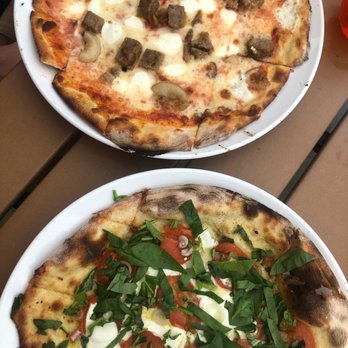 Uno Venti Pizzeria - Sausage + candied Cipollini (Top) Featured pie (bottom) - Pizza Near Me - La Crosse, Wisconsin Uno Venti Pizzeria - Sausage + candied Cipollini (Top) Featured pie (bottom) - Pizza Near Me - La Crosse, Wisconsin