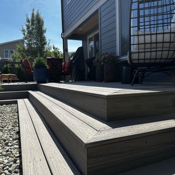 Premier Landscape Construction - Back yard trex patio, rock, and bushes. - Landscaping Near Me - Covington, Washington