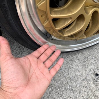 Dannys Db Tire Service - and what is this, I'll put my life on it, I had a valve stem cap on there when I pulled in. Four matching ones to be exact! - Auto Repair Near Me - Lake Worth, Florida