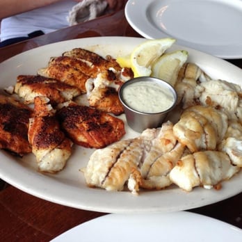 Pure Florida - The great snapper we caught today turned into a delicious lunch at RiverWalk - Boat Charters Near Me - Naples, Florida