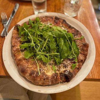 Pizzeria Toro - Soft egg, trumpet mushrooms, chiles, arugula, & parmesan white pizza - Pizza Near Me - Durham, North Carolina