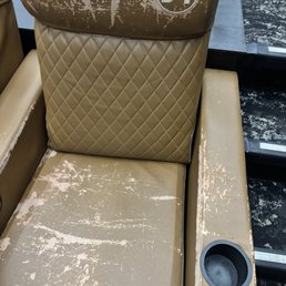 All of the chairs look like this in the theater I was in. All of the chairs look like this in the theater I was in.