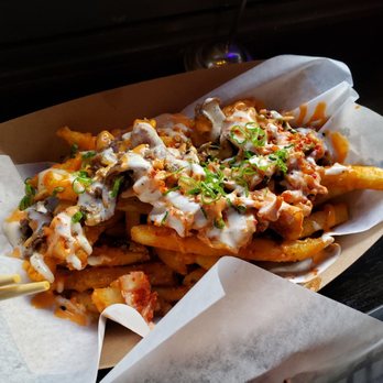 En Hakkore 2.0 - Kimchi and bulgogi fries. The underlying fries taste like curly fries (seasoning is on point) - Asian Fusion Near Me - Chicago, Illinois En Hakkore 2.0 - Kimchi and bulgogi fries. The underlying fries taste like curly fries (seasoning is on point) - Asian Fusion Near Me - Chicago, Illinois