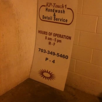 KP Touch - Their sign in a corner in a basement in a... - Auto Detailing Near Me - Arlington, Virginia