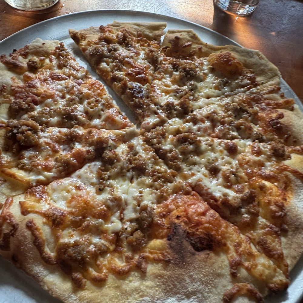 The Toasted Frog - Italian sausage pizza - New American Near Me - Fargo, North Dakota The Toasted Frog - Italian sausage pizza - New American Near Me - Fargo, North Dakota