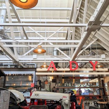 ADYA - the inside of a restaurant with a tractor in the foreground - Indian Near Me - Anaheim, California ADYA - the inside of a restaurant with a tractor in the foreground - Indian Near Me - Anaheim, California