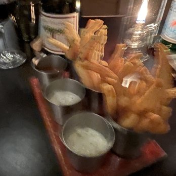 Bourbon Steak - pre-appetizer tradition from restaurant: fries made in duck fat, with three seasonings and three sauces.  Yum. - Steakhouses Near Me - Washington, DC, District of Columbia