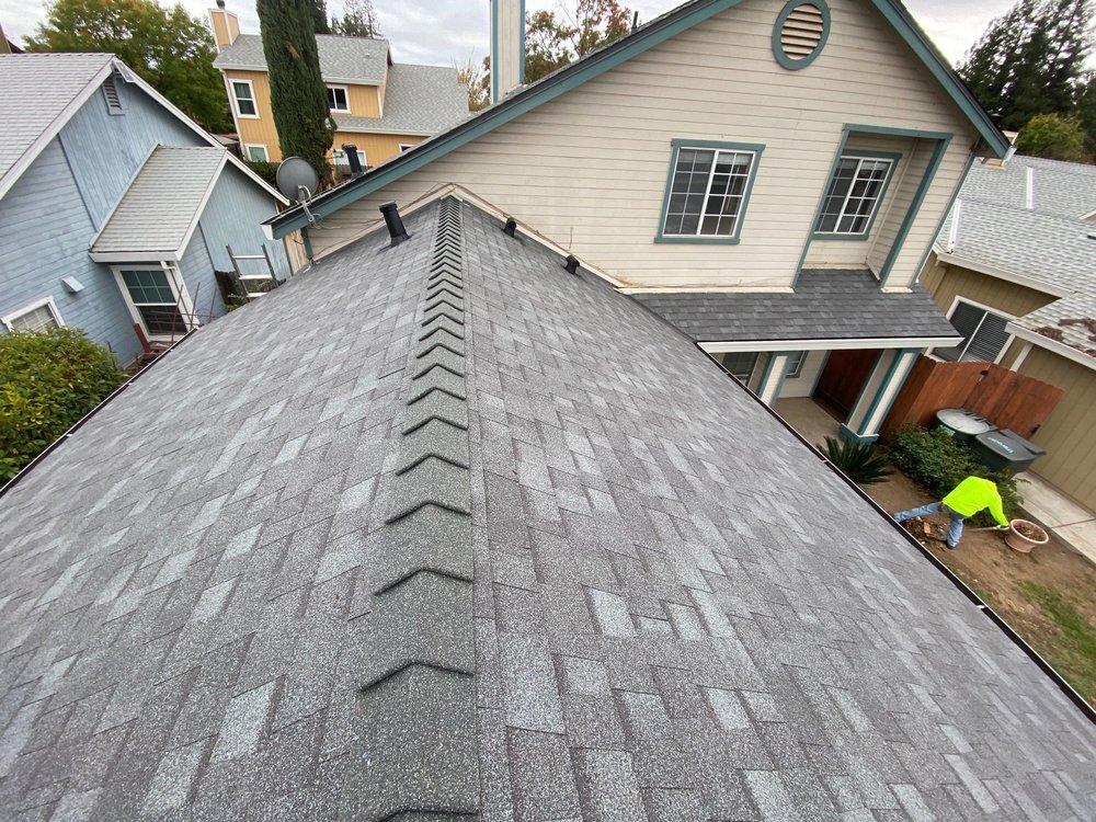 Slide of Los Reyes Roofing