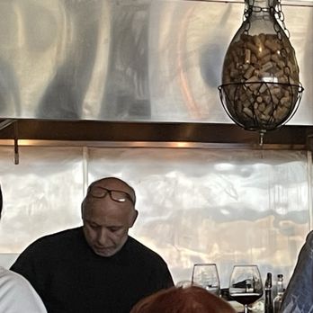 Truffle Bistro - Chef hard at work serving 40 all at once - Italian Near Me - Orange, California Truffle Bistro - Chef hard at work serving 40 all at once - Italian Near Me - Orange, California