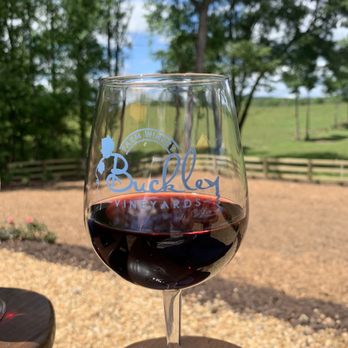 Buckley Vineyards - Enjoying a delicious glass of wine  at Buckley Farm Winery and Vineyards. - Wineries Near Me - Ellijay, Georgia