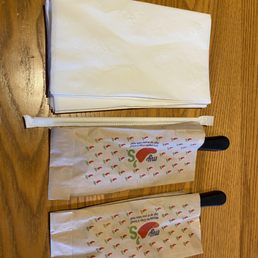 Nice little packets with our flatware, and a lot of napkins. Nice little packets with our flatware, and a lot of napkins.