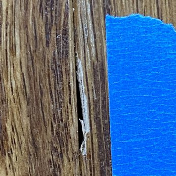 Modern Flooring Services - one of dozens of chips/gouges in the brand new floor - Flooring Near Me - Mukilteo, Washington Modern Flooring Services - one of dozens of chips/gouges in the brand new floor - Flooring Near Me - Mukilteo, Washington