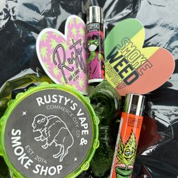 Rusty's tee, acrylic grinder, lighters, Rusty's stickers, glass bowl Rusty's tee, acrylic grinder, lighters, Rusty's stickers, glass bowl