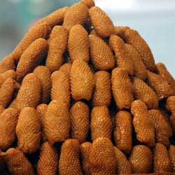 Sweet Castle - Maacaron: made with anise seed and semolina flour, deep fried then dipped in syrup.