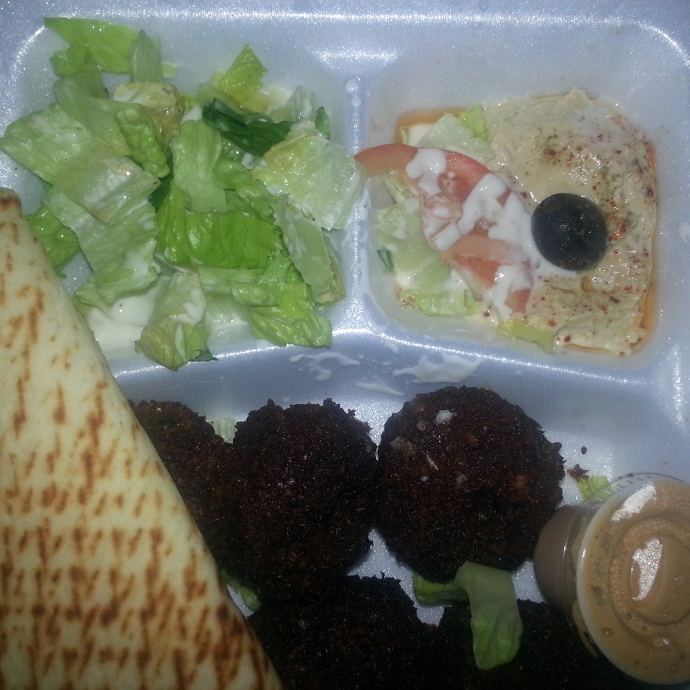 Leo's Taverna Express - These falafles are ono too. Looks dark because my phone camera sucks. - Greek Near Me - Honolulu, Hawaii Leo's Taverna Express - These falafles are ono too. Looks dark because my phone camera sucks. - Greek Near Me - Honolulu, Hawaii