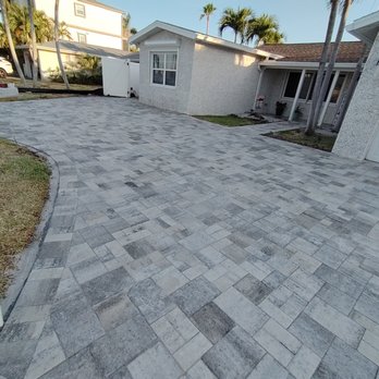 Penca Paver Resorts - Paver driveway with walkway, precisely and professionally crafted by us. Tailored to our clients specifications and use. - Landscaping Near Me Penca Paver Resorts - Paver driveway with walkway, precisely and professionally crafted by us. Tailored to our clients specifications and use. - Landscaping Near Me