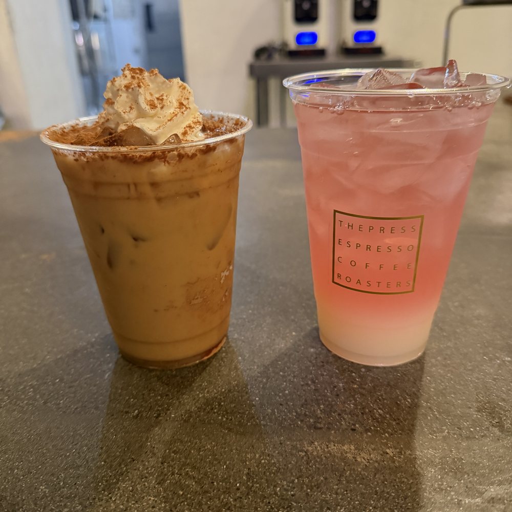 The Press Espresso - Bananas Foster Latte (with Cold Brew) and Blueberry Palmer Lemonade - Coffee & Tea Near Me - Temecula, California The Press Espresso - Bananas Foster Latte (with Cold Brew) and Blueberry Palmer Lemonade - Coffee & Tea Near Me - Temecula, California