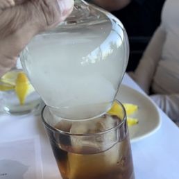 "Smokey" old fashioned. Very tasty drink with a unique presentation.