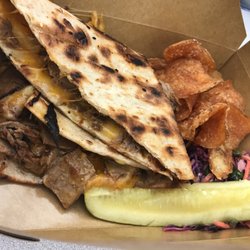 Paradise Melts - BBQ Brisket Melt with pickle, chips and coleslaw
