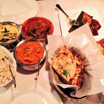 Chola - Coconut rice and veggies cooked in yogurt and curry leaves on the left - Indian Near Me - New York, New York